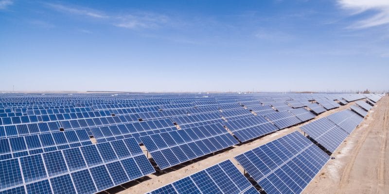 Rows of photovoltaic panels at a solar installation